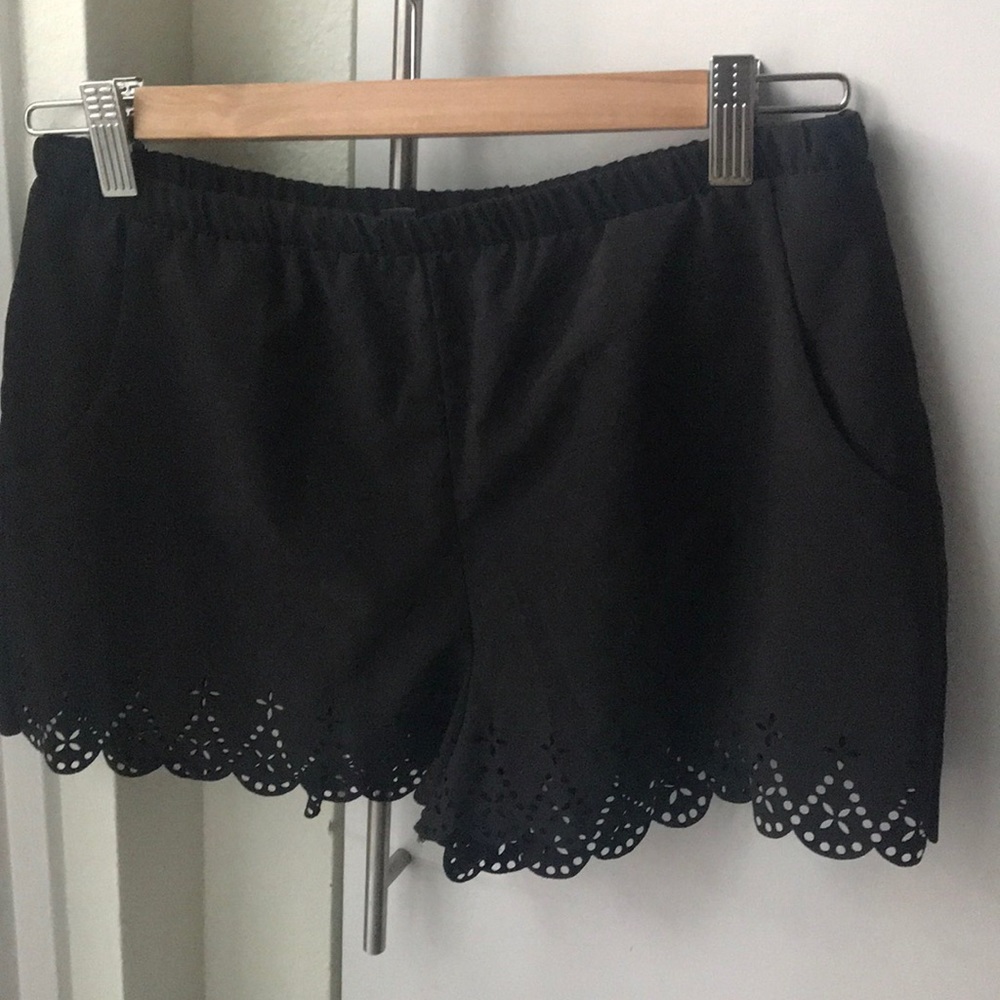 Laser cut woven shorts